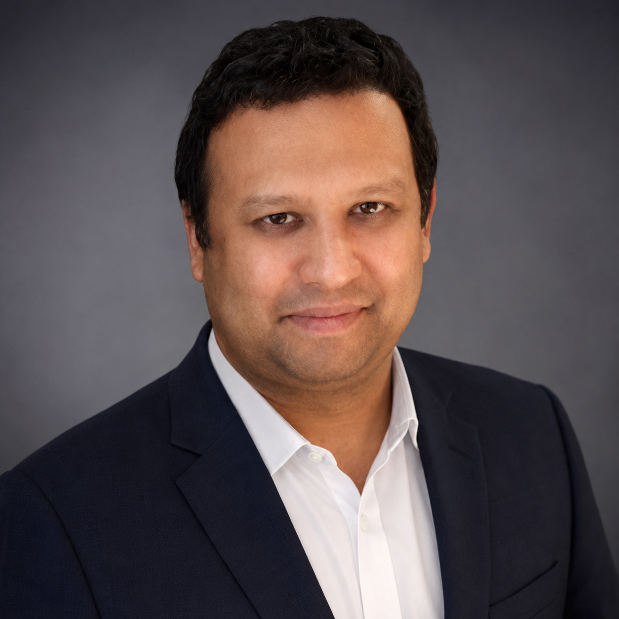 Professional headshot of Niaz Faiz